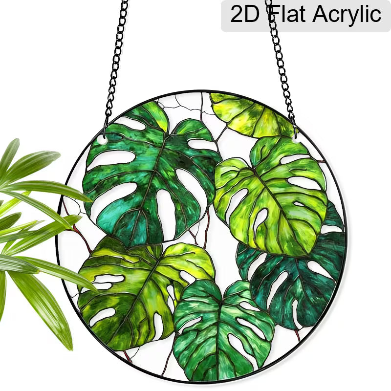 Monstera acrylic suncatcher with green tropical leaf design